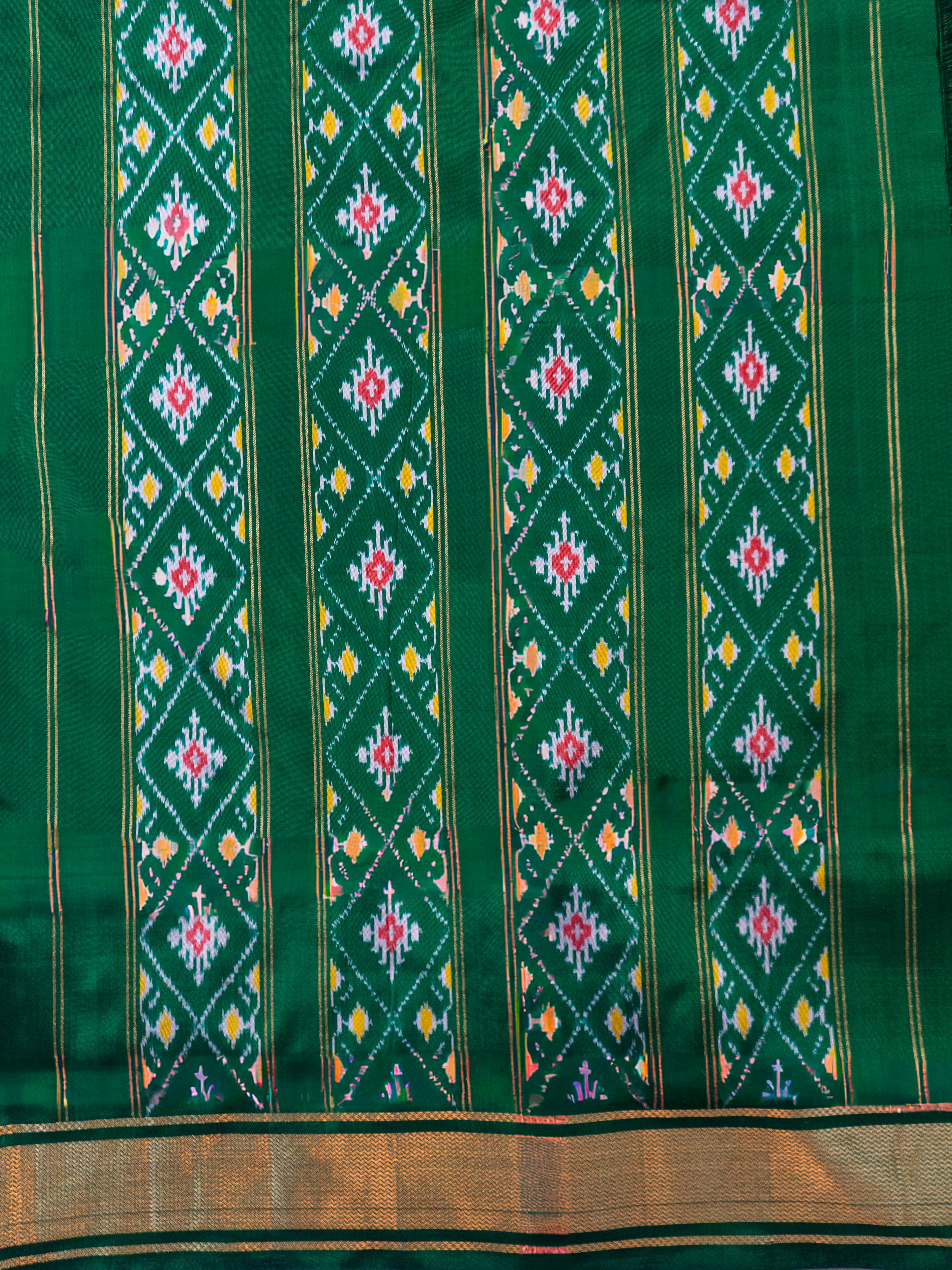 Pure Pochampally Silk Saree in Deep Bottle Green with Ikat & Zari Weaving