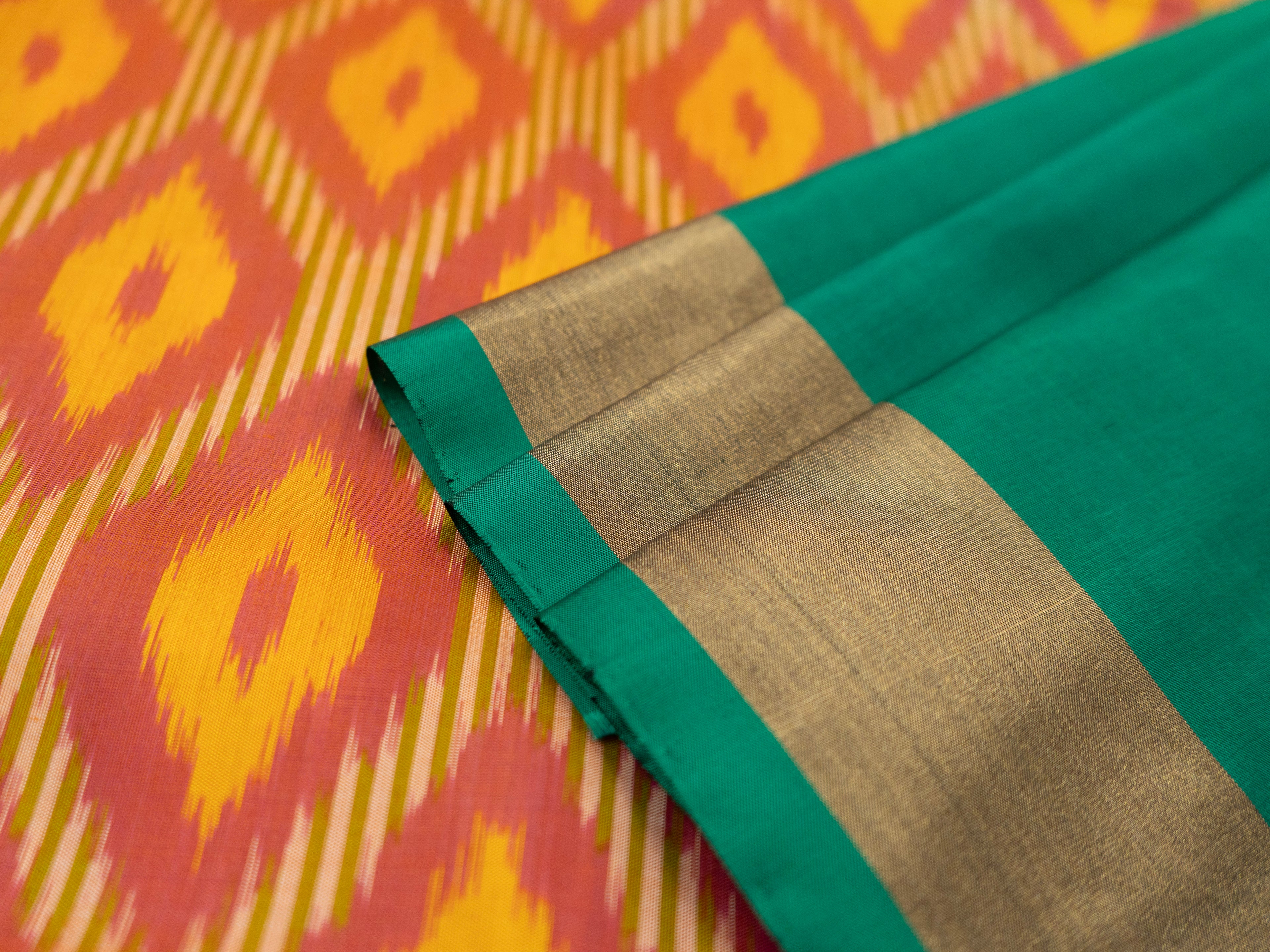 Pure Pochampally Silk Saree in Orange with Green Ikat Pallu & Multicolor Weaving