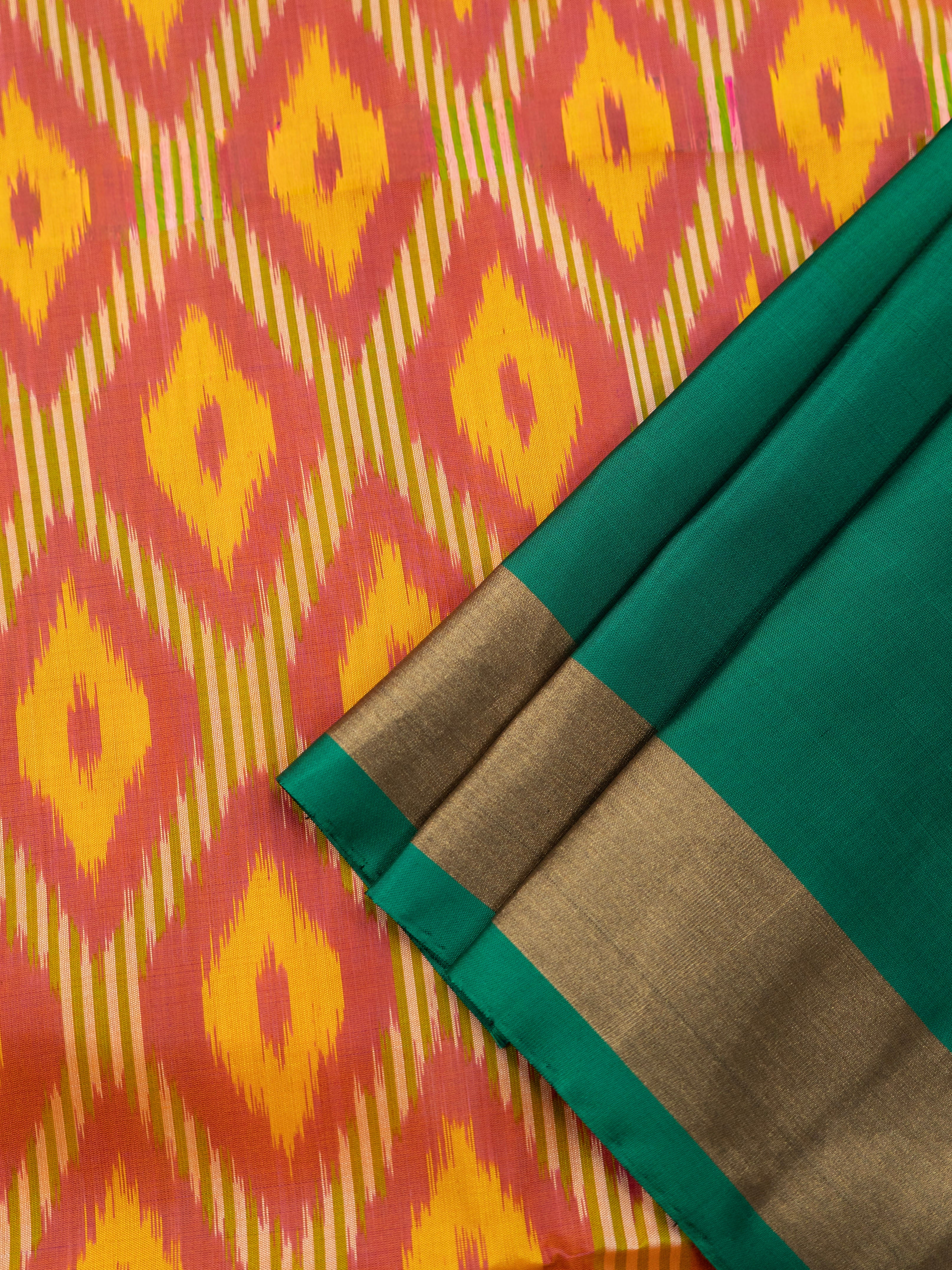 Pure Pochampally Silk Saree in Orange with Green Ikat Pallu & Multicolor Weaving