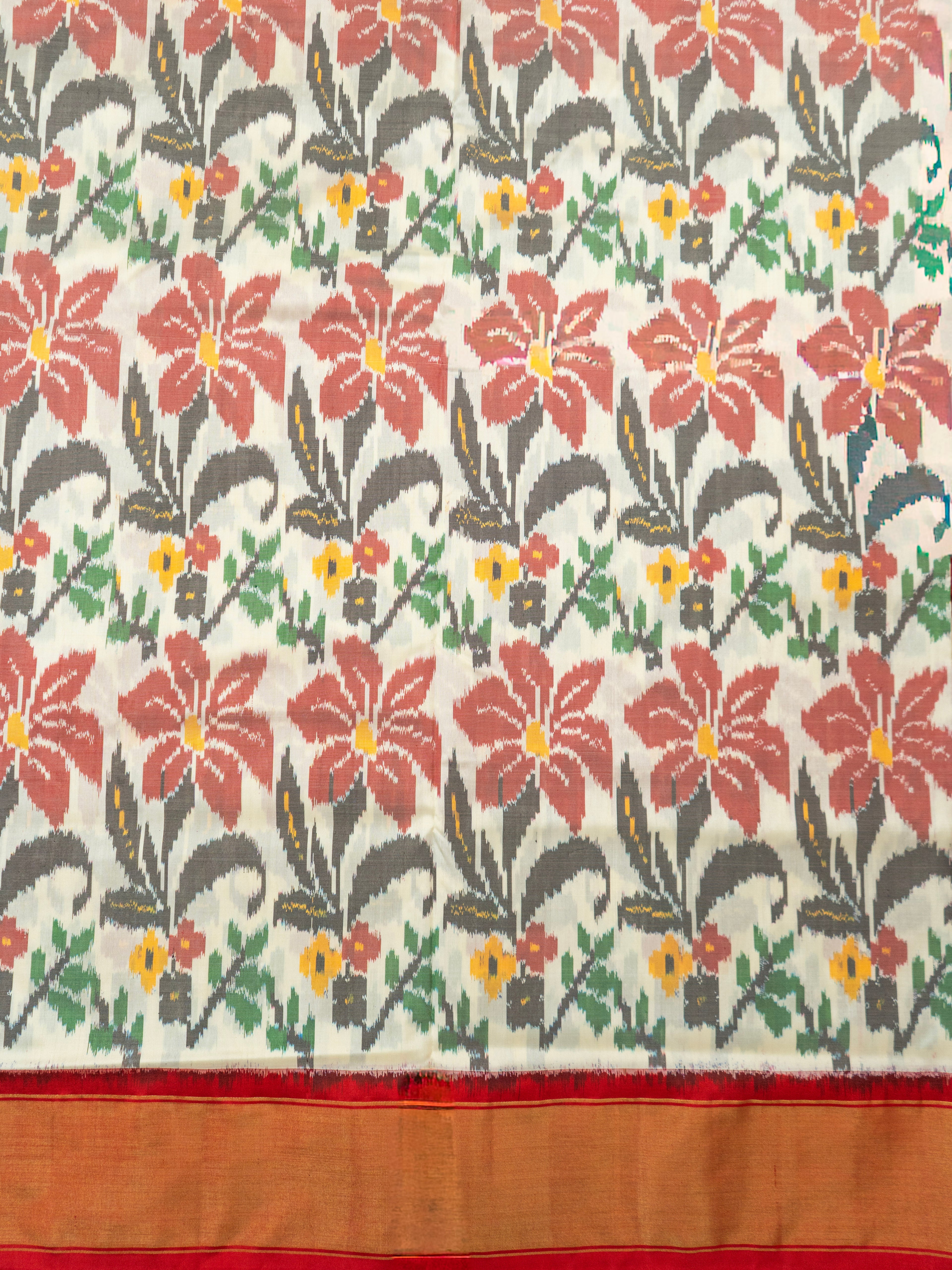 Pure Pochampally Double Ikat Silk Saree in White with Red Ikat Floral Pallu