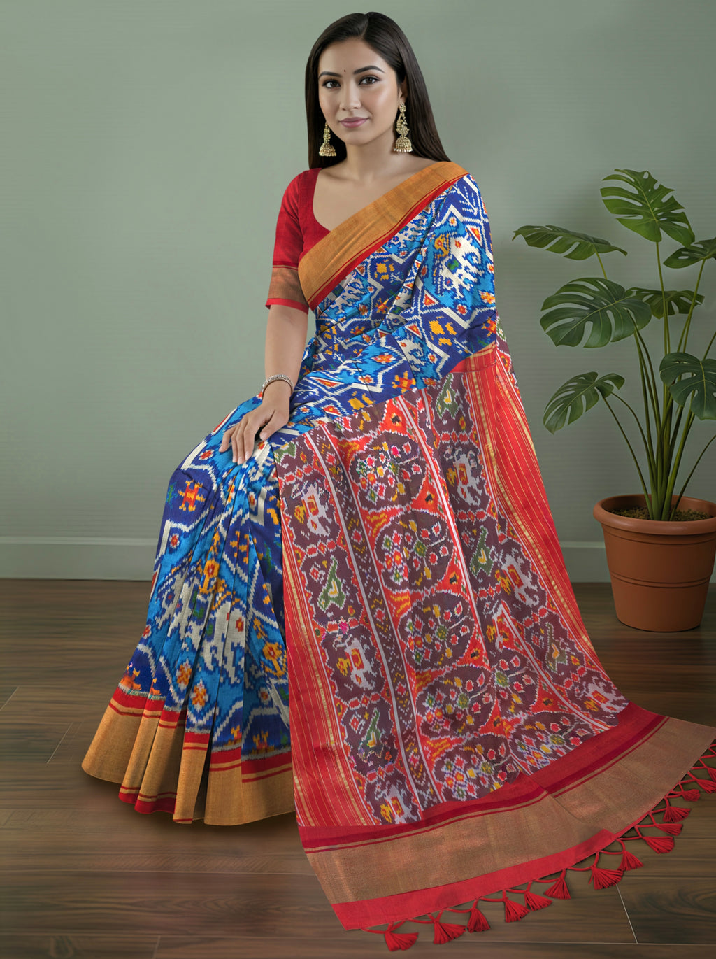Pure Pochampally silk saree in Blue double ikkat with designer pallu and contrast Blouse