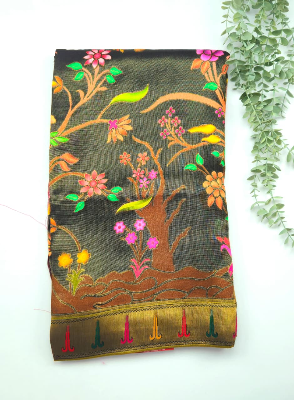 Kanchivaram floral work saree in black base with pallu and floral blouse