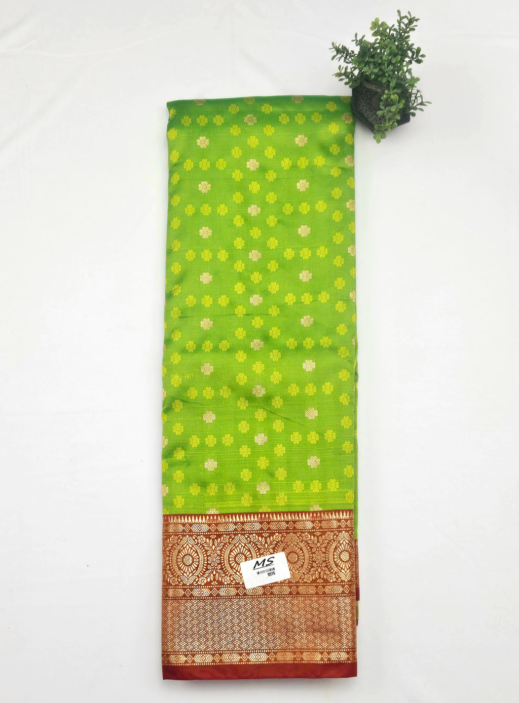 Kanchivaram golden weave saree in light green color with pattu border