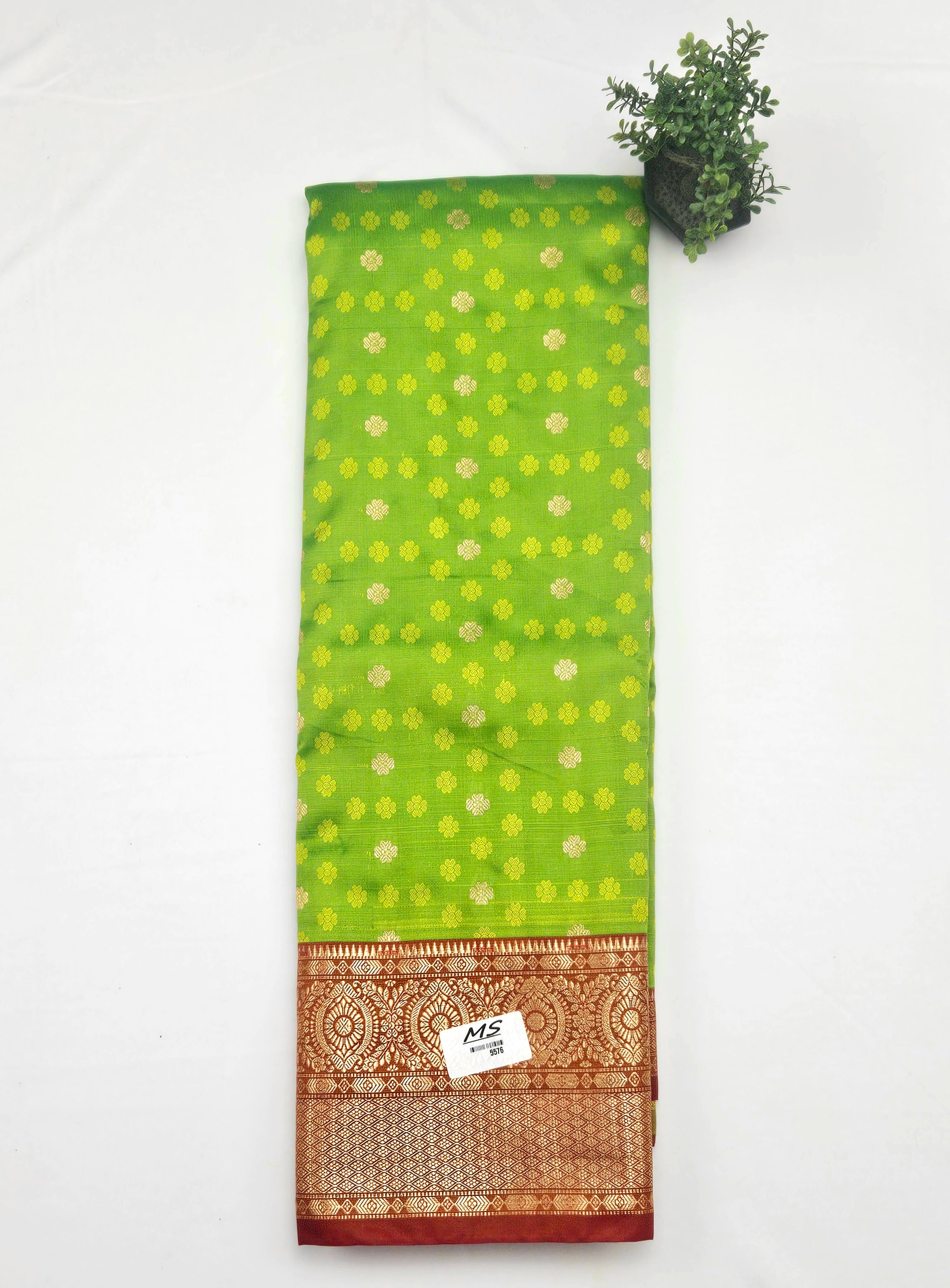 Kanchivaram golden weave saree in light green color with pattu border